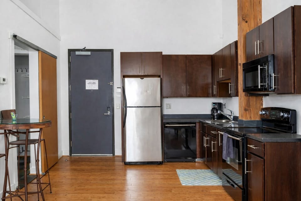 Full kitchen with standard coffee maker.