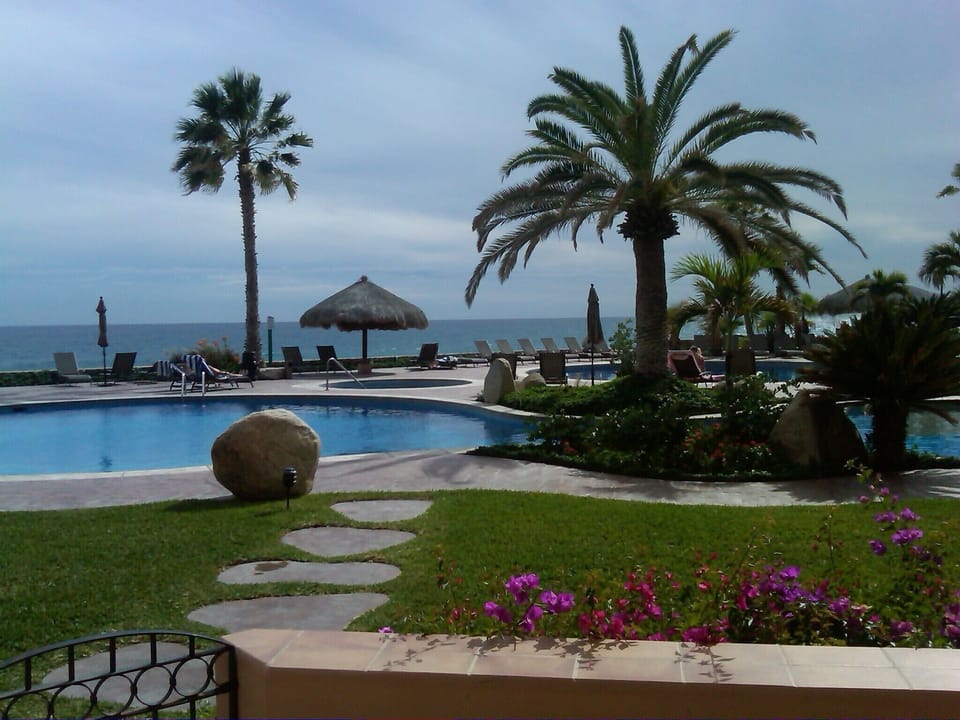 Ocean and pool are only steps from the patio.