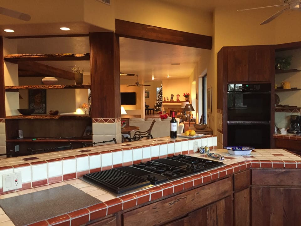 Six burner gas stove/grill, two  ovens, sub zero style refrigerator, wine fridge