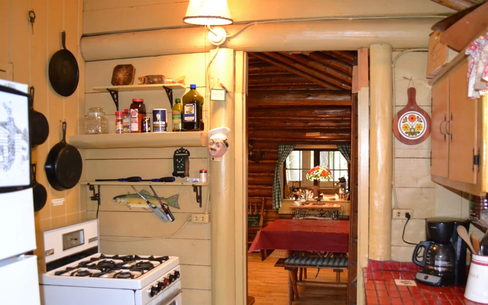 Kitchen Stove, Fridge, and Coffee Maker.  
