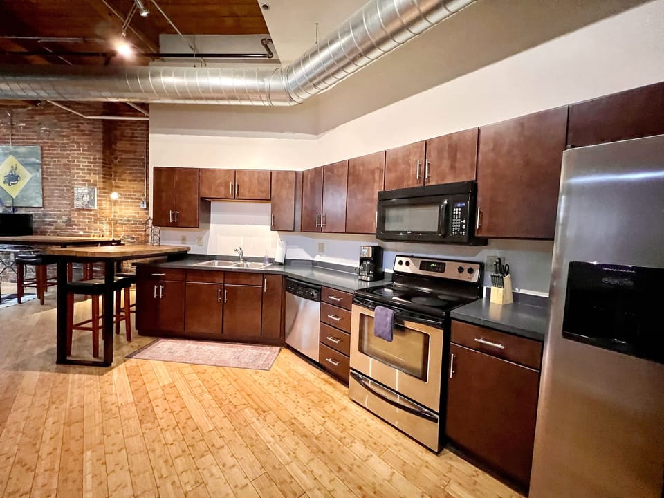 Full kitchen with standard drip coffee maker.