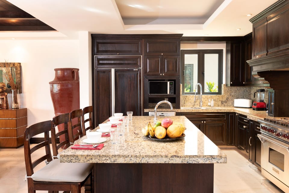 Our kitchen has all the amenities you'd need, plus our fantastic cook.