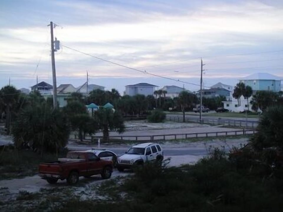 Playground and basketball court accross the road from the house