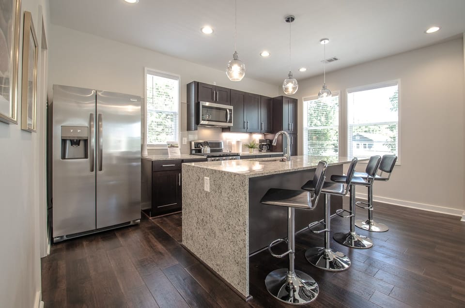 Modern Kitchen with Stainless Appliances & Granite Counters