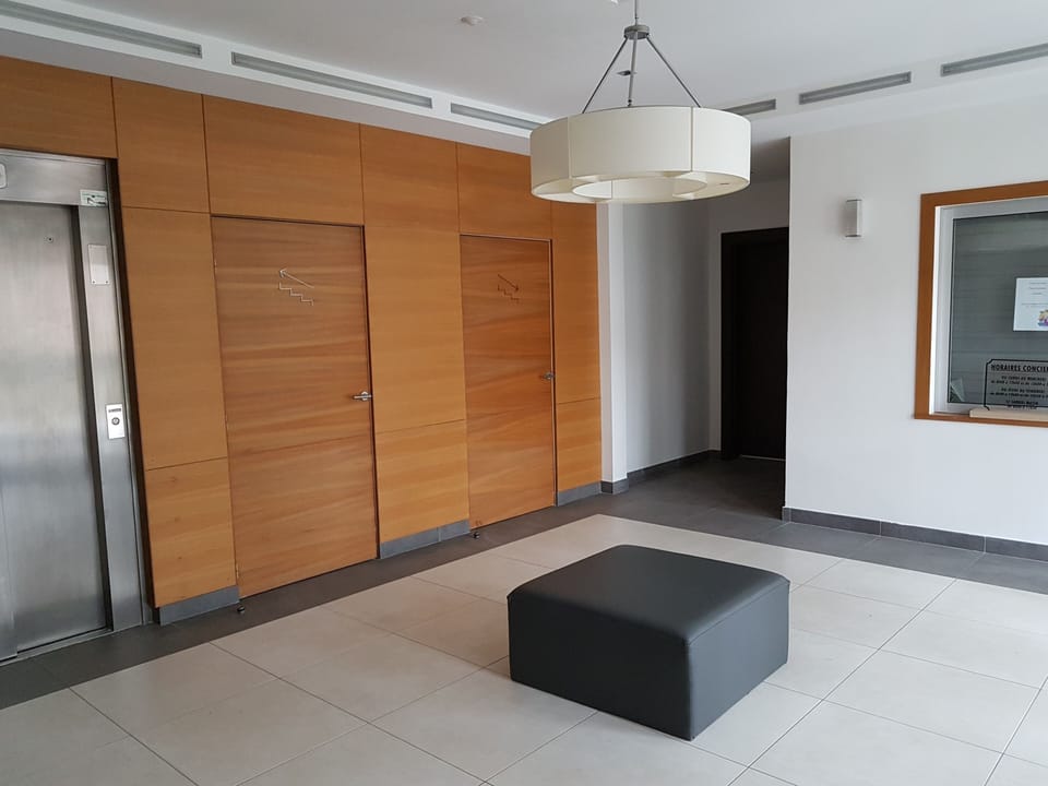 Bright and modern lobby of the upscale Residence
