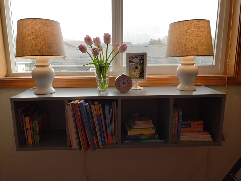 Bottom floor bunkbed room - books for kids, pack n' play, etc. 