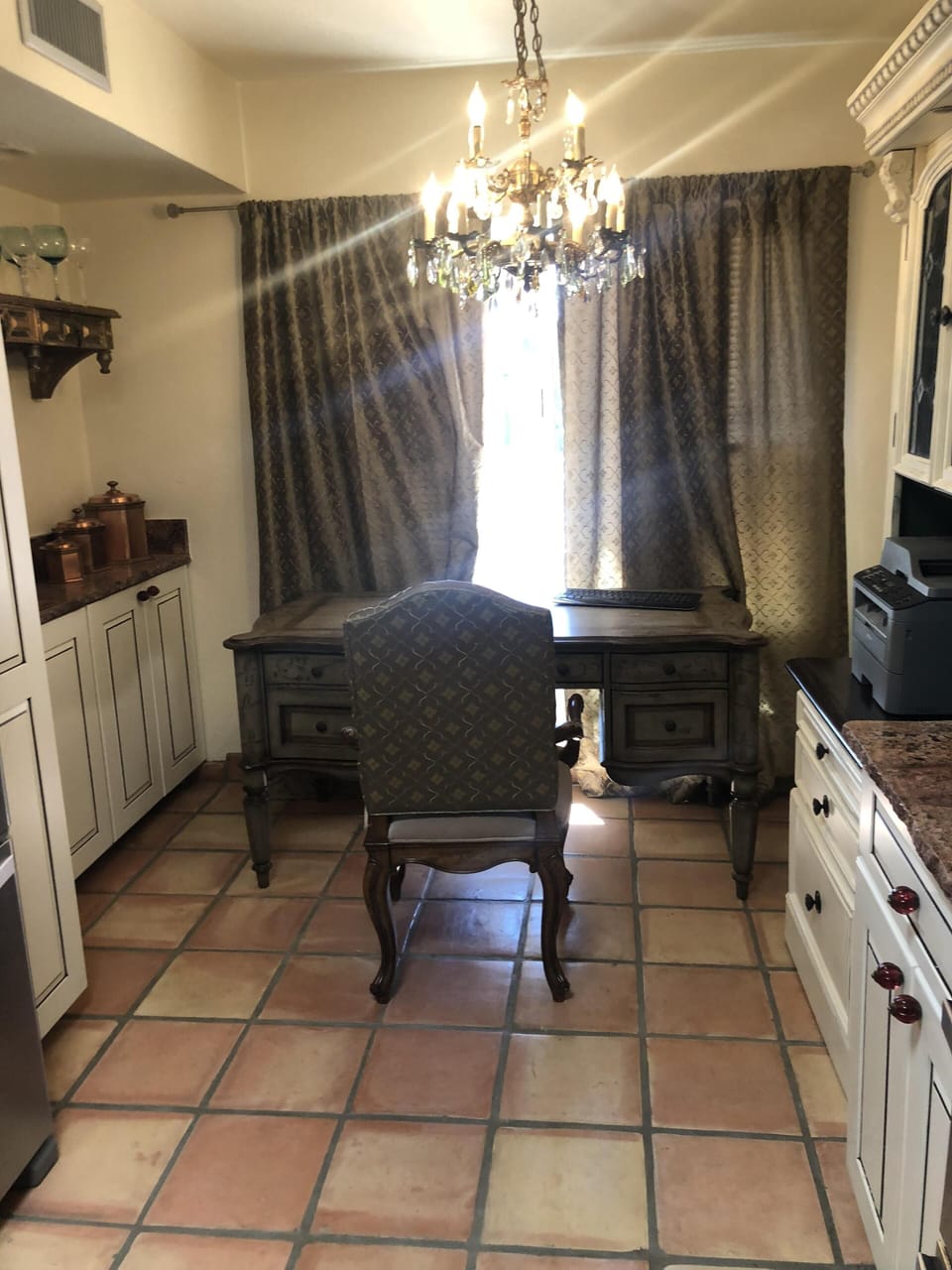 Desk and area for laptop and to work in front of bright window.