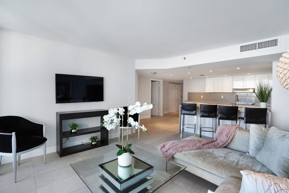 Living room, Roku tv, balcony access , fully equipped open concept kitchen 