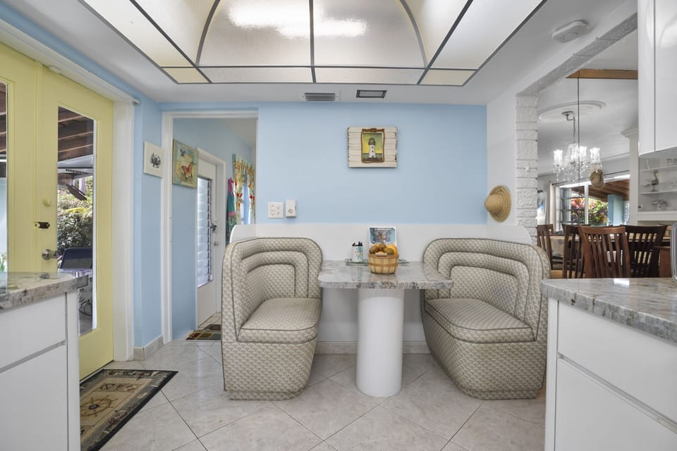 Eat-in kitchen connects directly to the patio and the laundry room. 