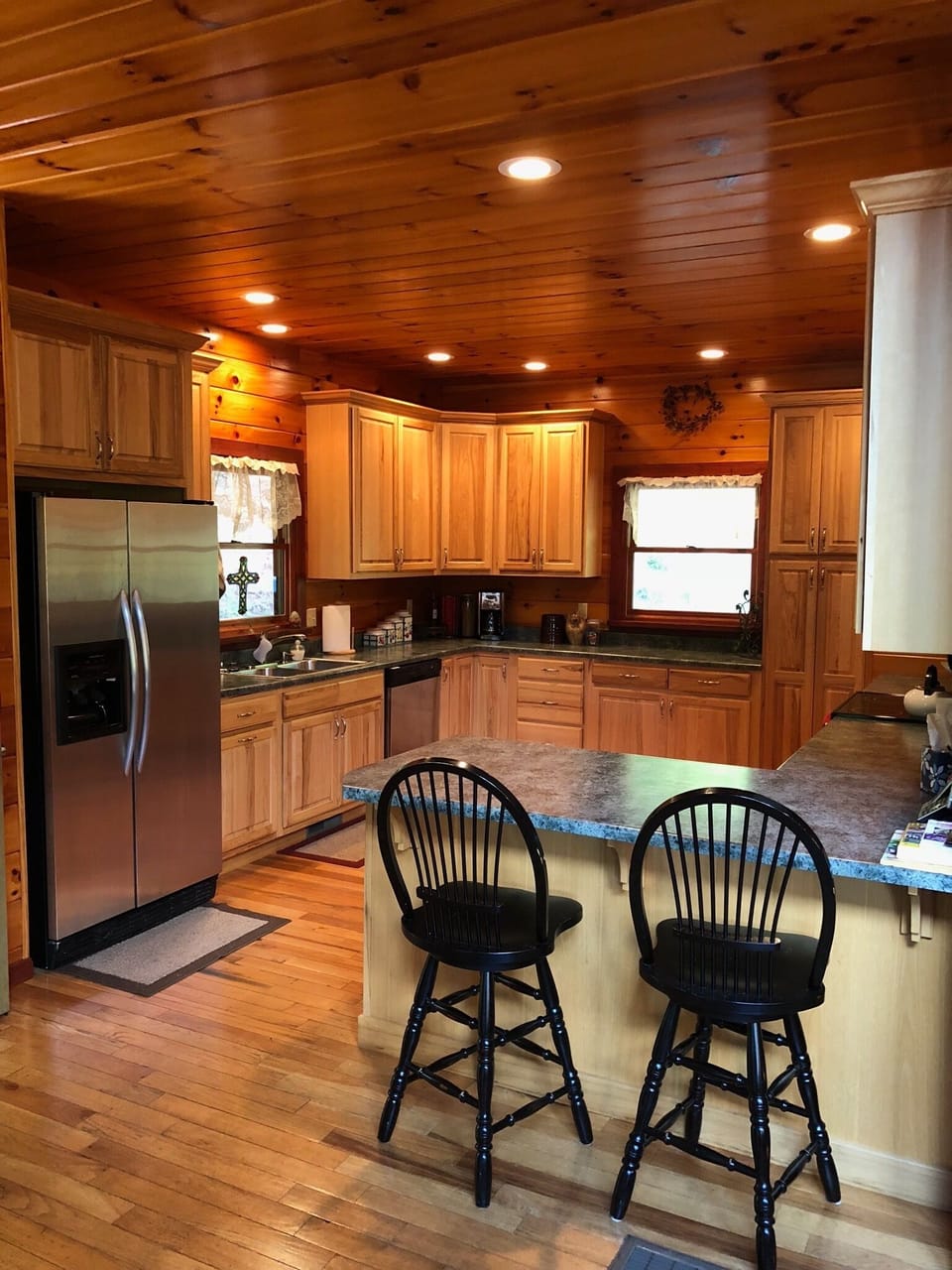 The fully equipped kitchen with eat in breakfast area