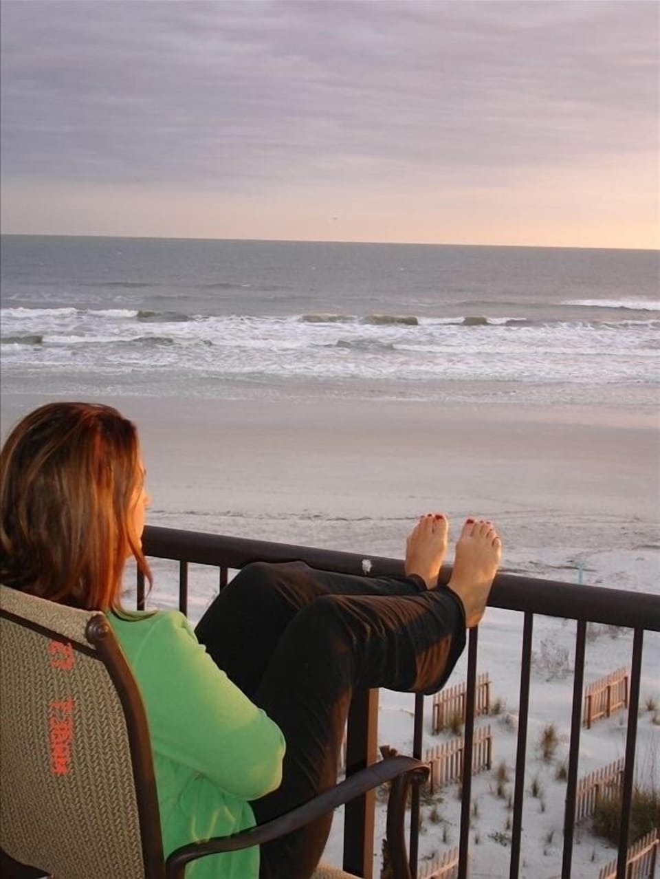 The balcony looking down onto the beach is a great place to relax and unwind