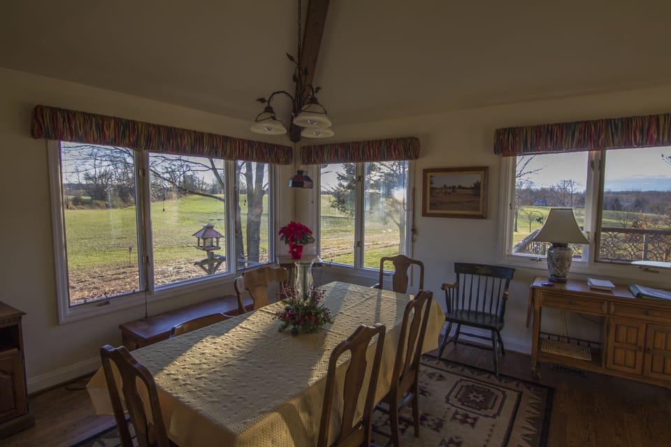 Dining room is huge! Seats 10, wrapped in windows onto spectacular scenery.