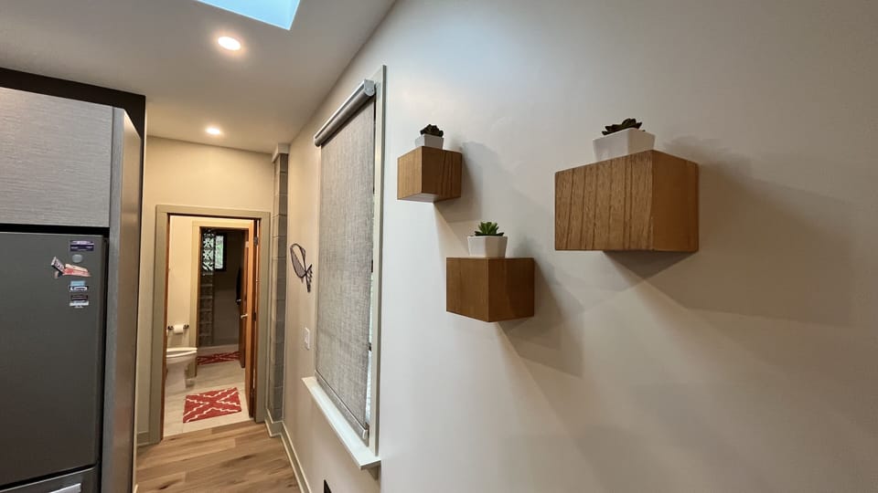 Hallway looking into upstairs bath