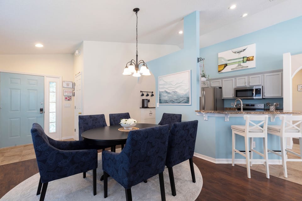 Elegant dining area with seating for six- perfect for family meals.