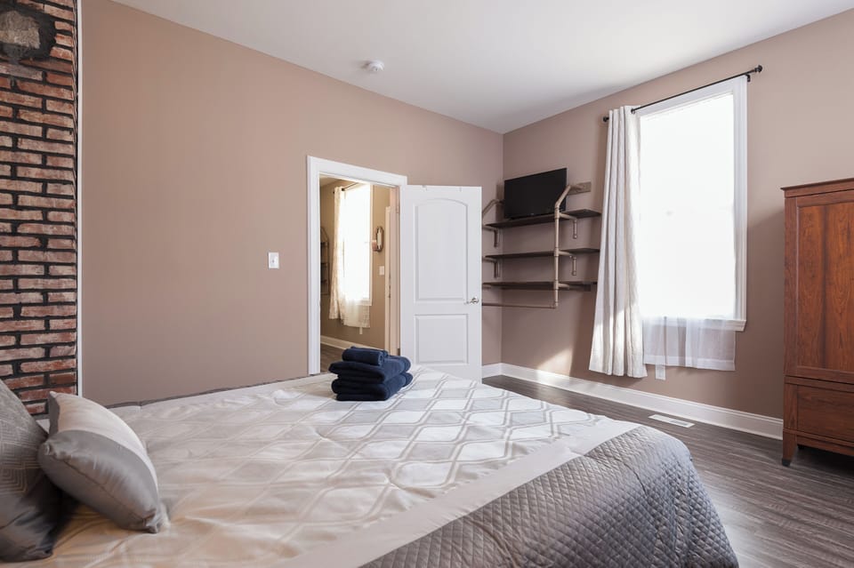 Bedroom 1 with Queen Bed and Smart TV