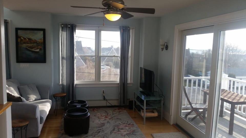 Living room TV area with ocean view