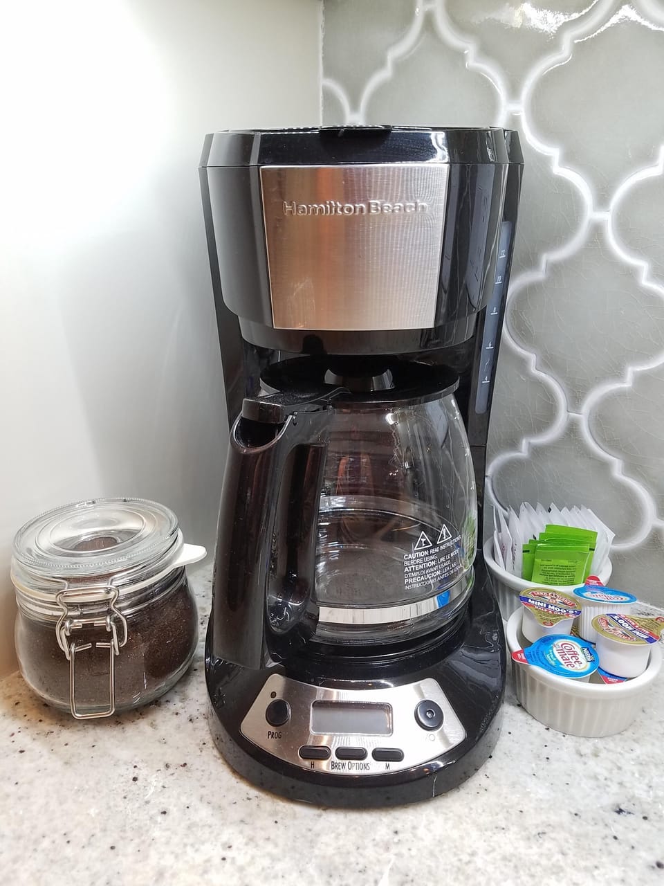 Complimentary coffee, creamer and sugar