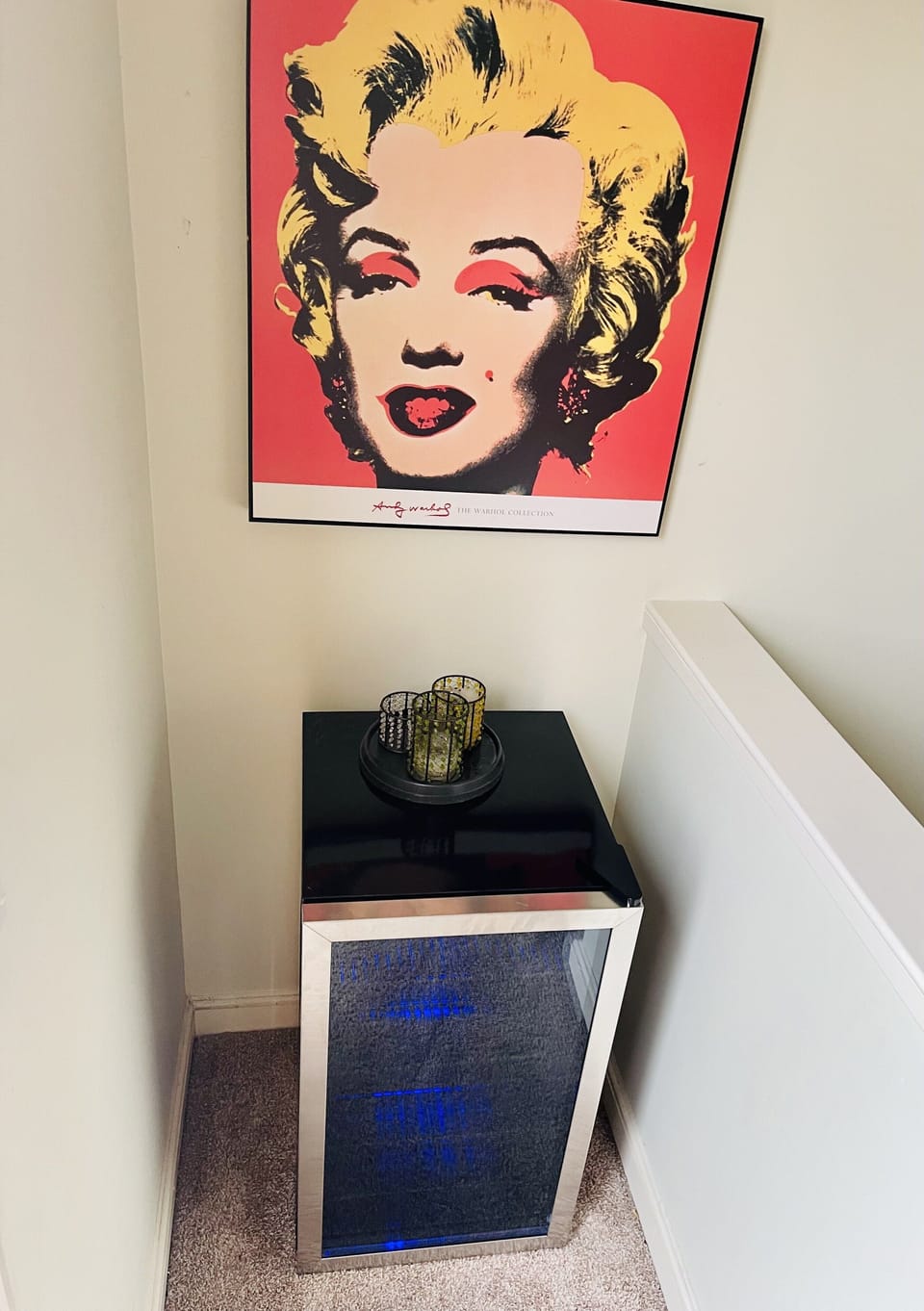 Beverage cooler beside the door to furnished rooftop to enjoy cold beverages!