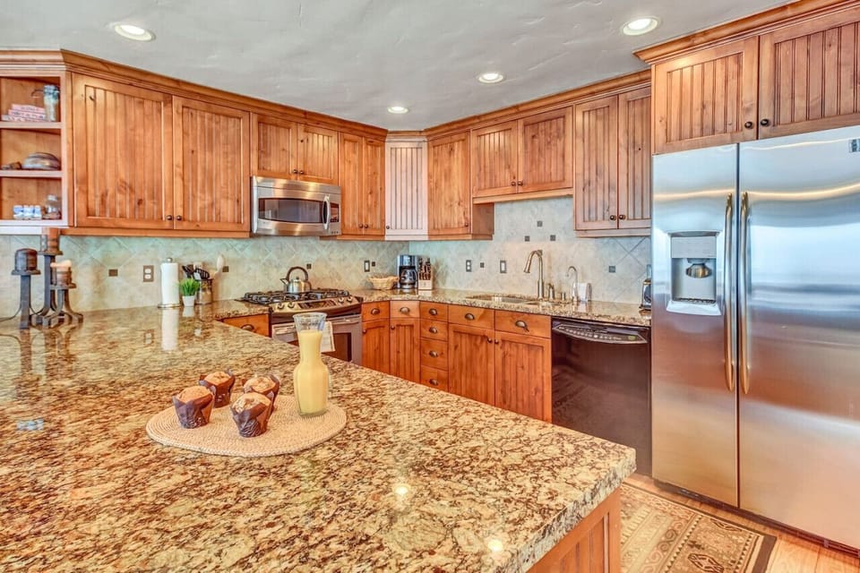Spacious kitchen connected to living area.
