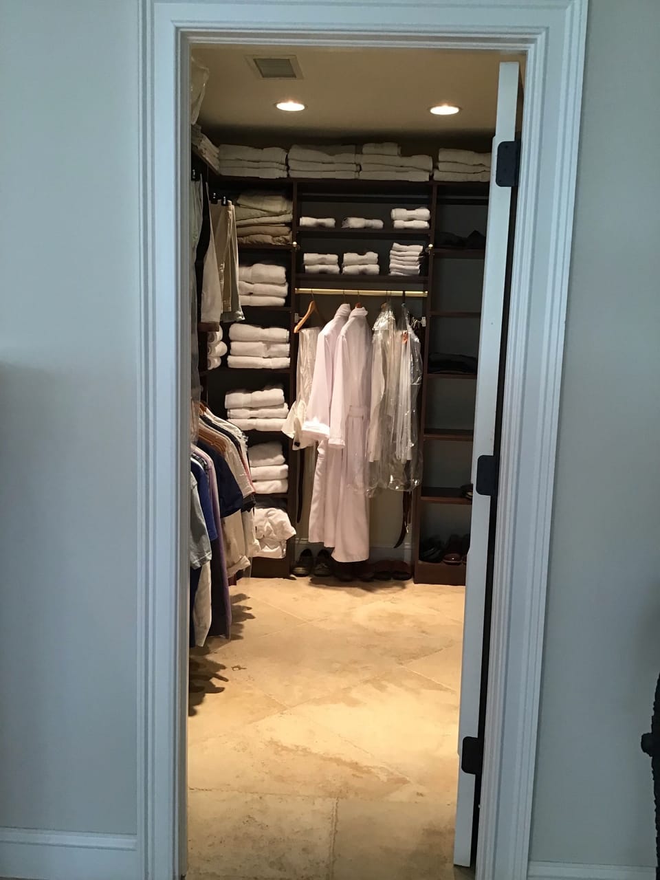 Master walk-in closet with built ins. 
