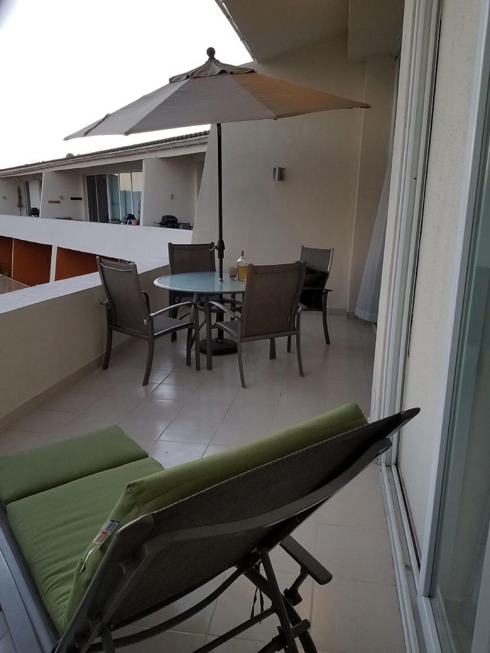 balcony on top floor of building