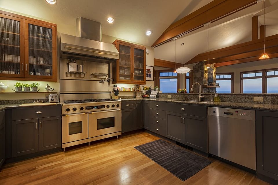 Chef's kitchen with professional grade appliances and granite countertops