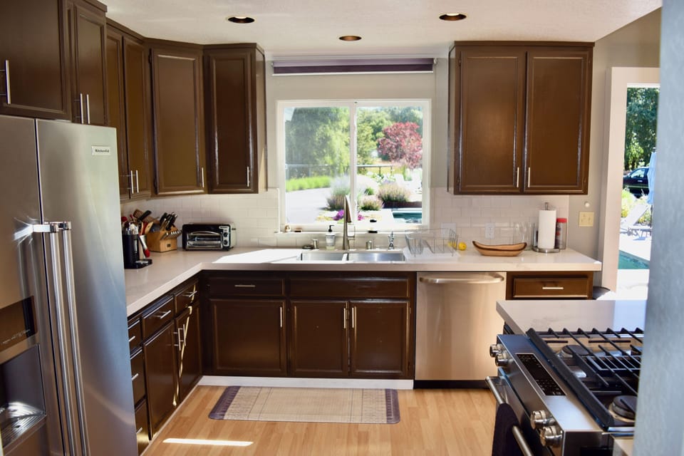 Kitchen with stainless steel appliances.