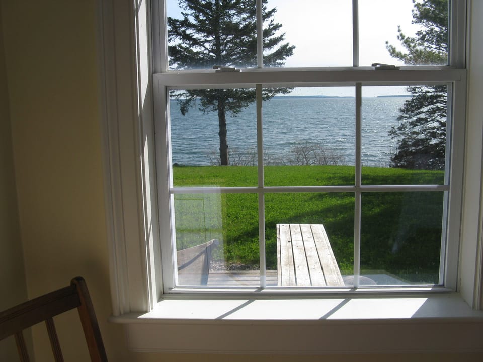Queen Bedroom.    Photo taken without curtain to show view of Blue Hill Bay