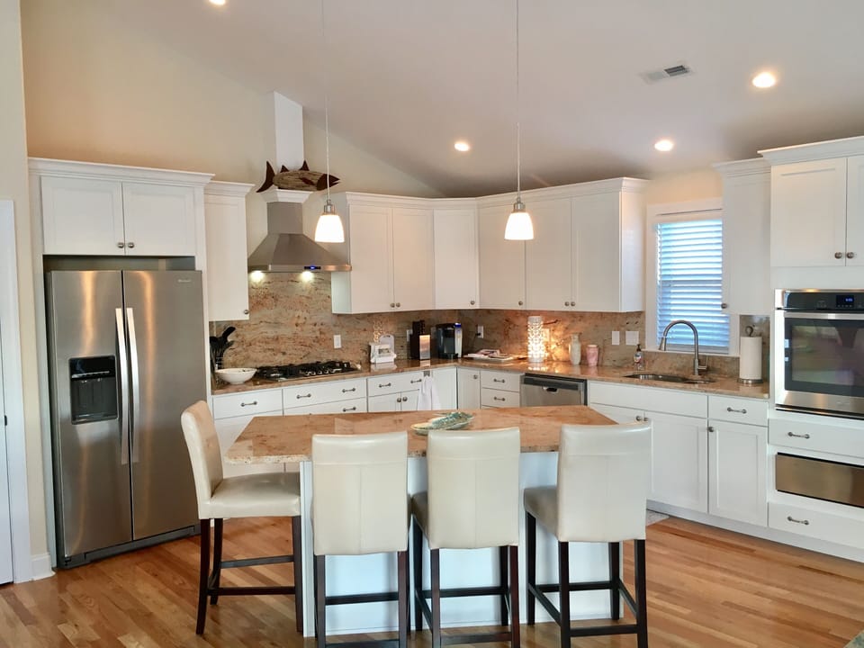 Well stocked kitchen with granite & state of the art stainless steel appliances