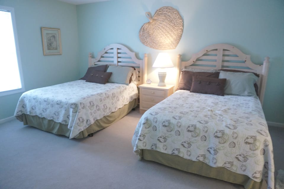 Second master suite with 1 full and 1 queen & attached full bath. Crib in closet