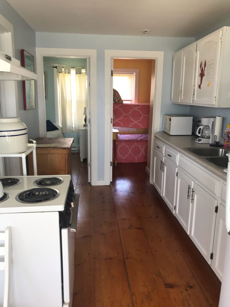 Guest quarters kitchen to bedrooms.