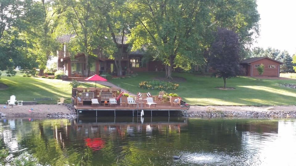 Relax with your own private beach located on  your own 5 acre non motorized lake