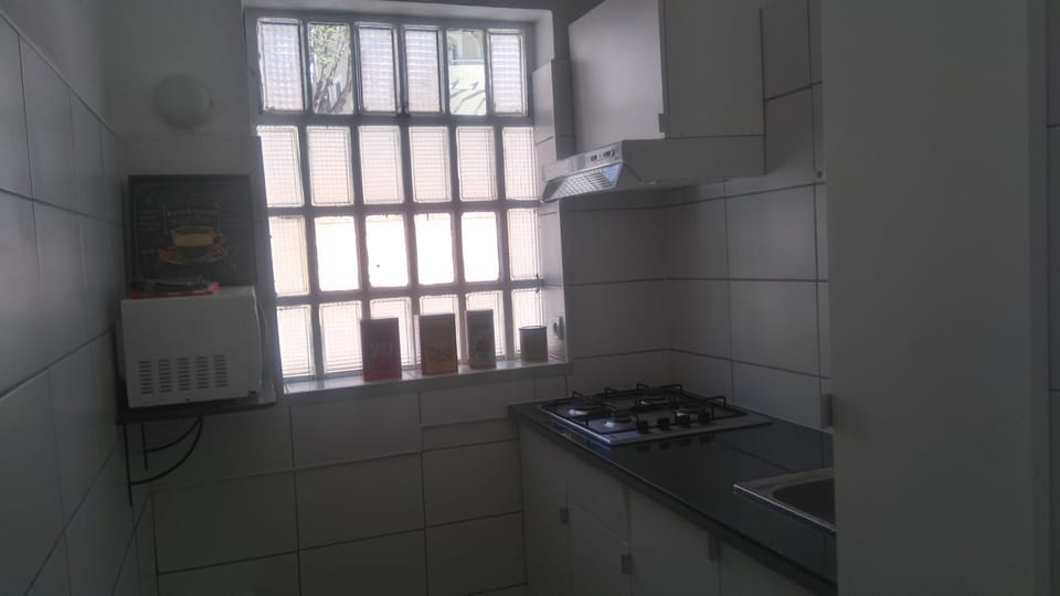 kitchen,  4 burnerstove,  microwave, toaster, kettle, coffeemaker