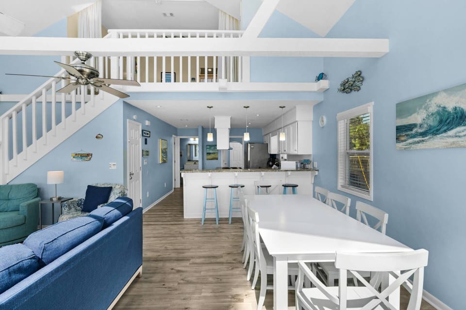 Open concept living and dining space flooded with natural light!