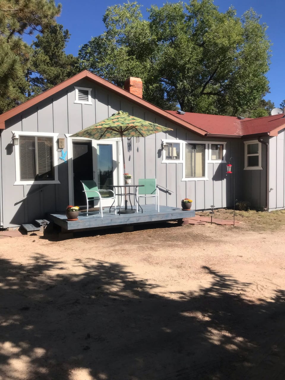 Cottage patio deck with slider access 
