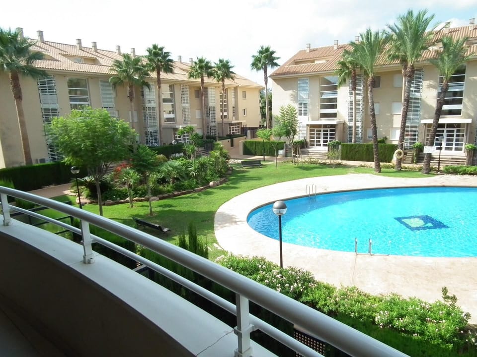 View from our balcony of large pool & tropical gardens
