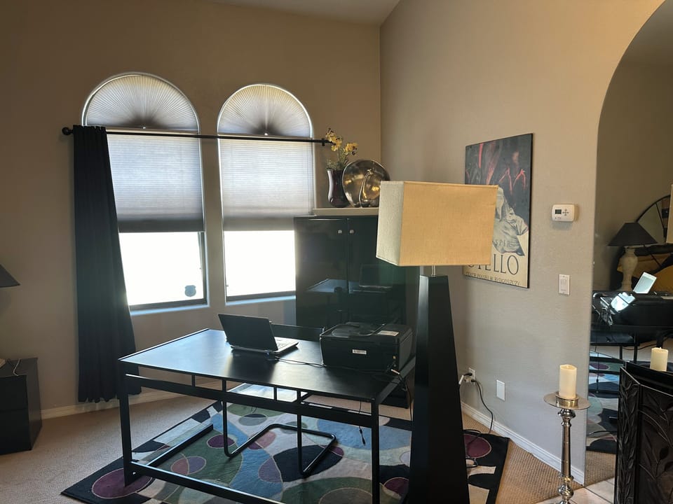 Master bedroom office desk, lamp and armoire