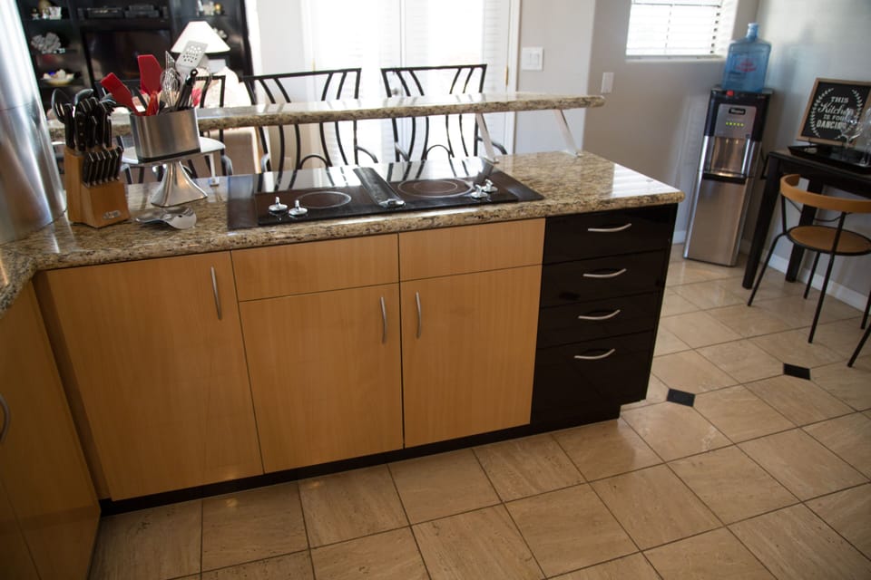 Kitchen island, stove top includes all cooking essentials