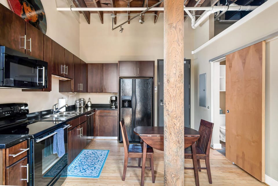 Full kitchen with standard drip coffee maker.