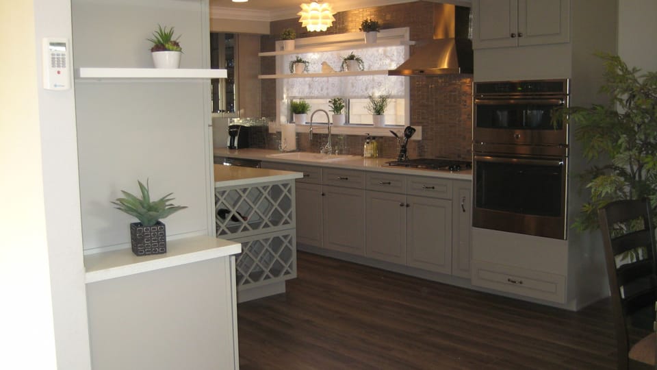 Toaster, Blender, toaster oven, pots, food processor, pans all in the pantry