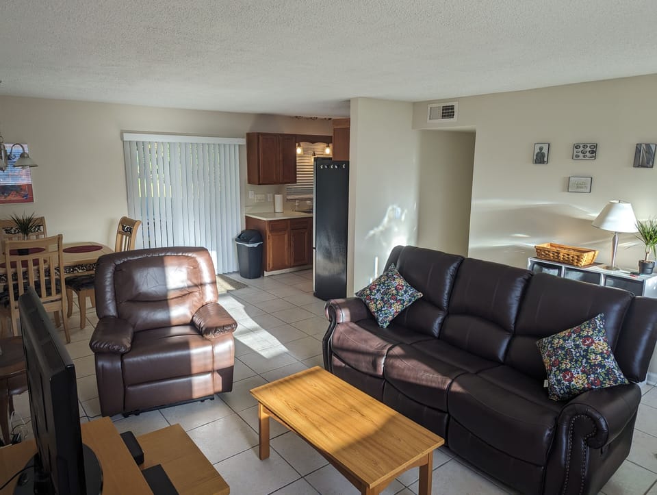 Electric recliner and reclining leather sofa