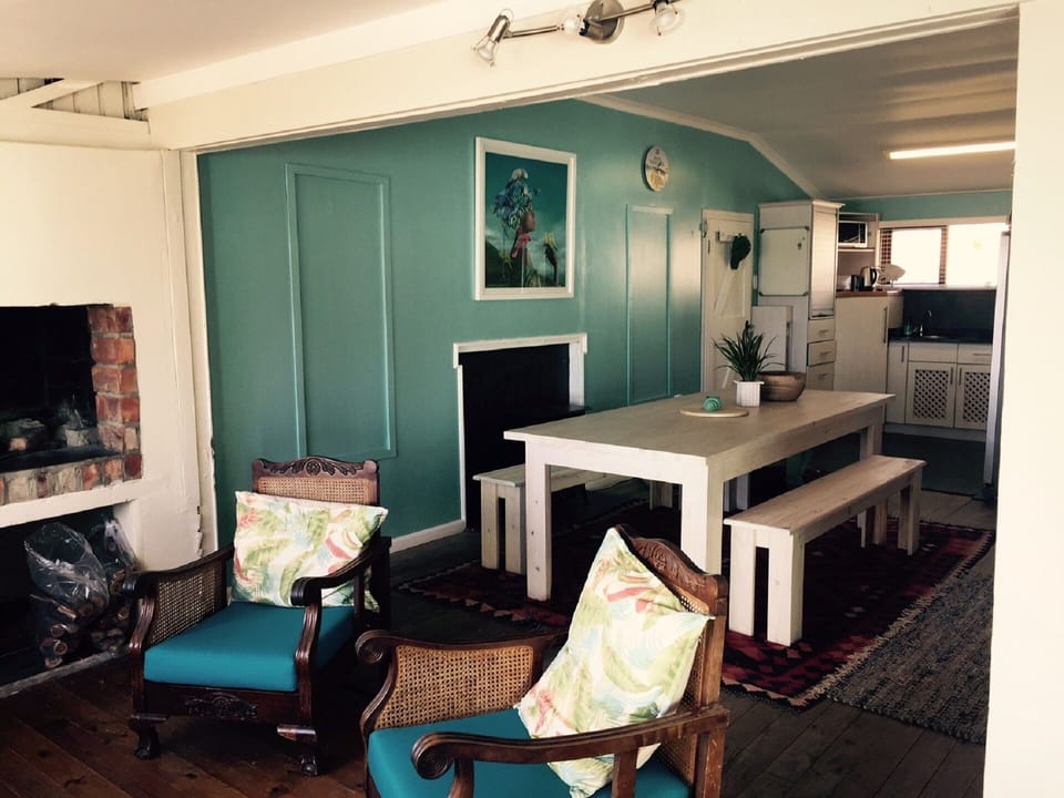 Indoor braai area through to kitchen.