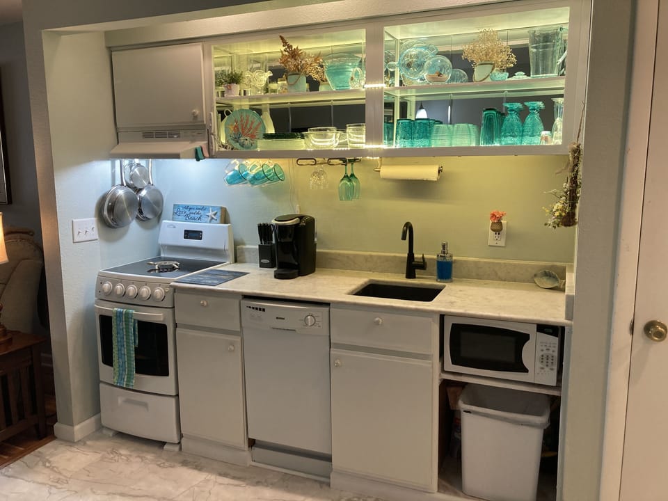 Beautiful new white, bright flooring and kitchen
