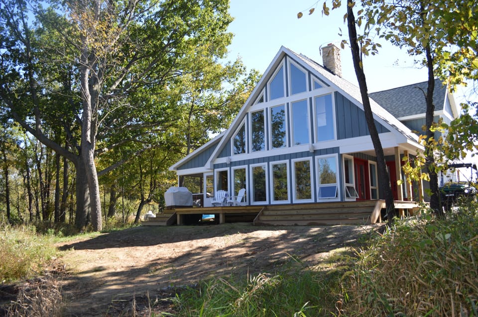 Wall of windows overlooking Bolt Late.  