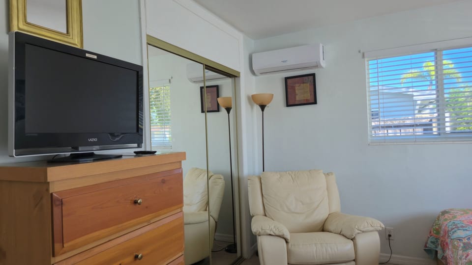 Bedroom 1 - Two Queen Beds - HDTV and Swivel Rocking Leather Chair