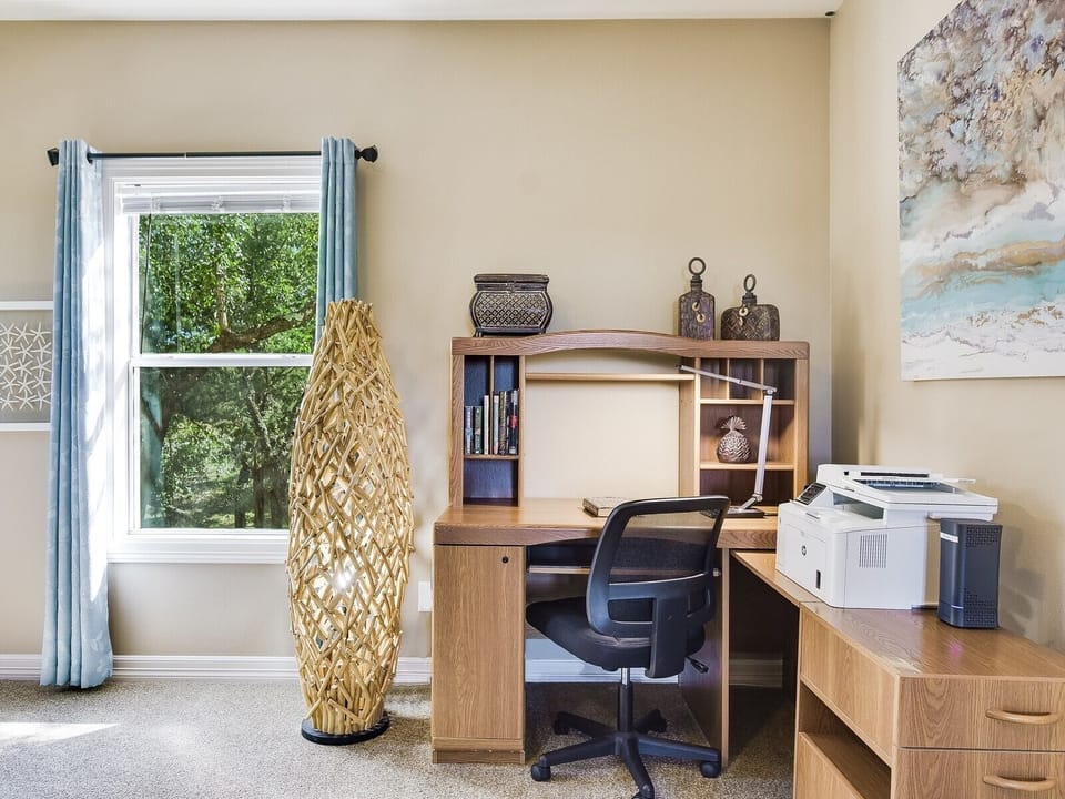 Work space with printer in primary bedroom 
