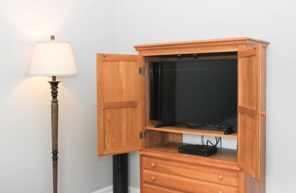 Dresser with TV in the master bedroom.