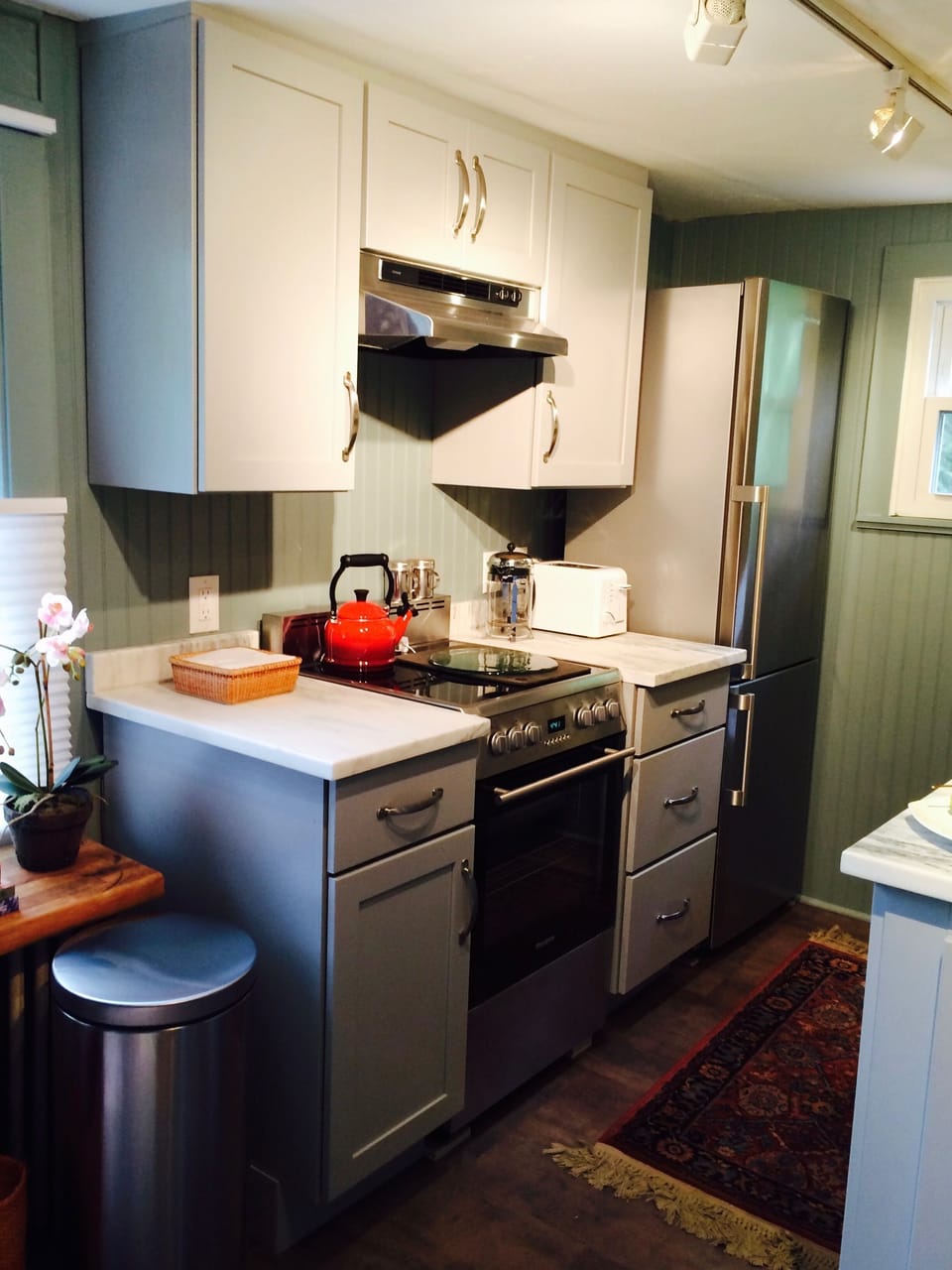 High end, European appliances for full functionality in an efficient space.