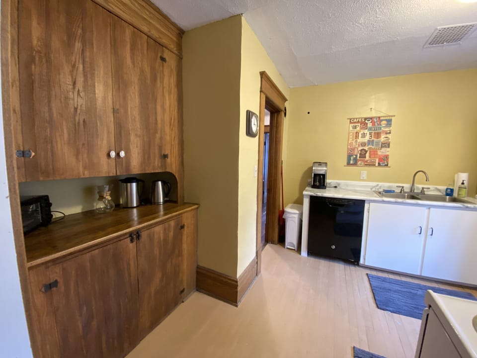 Kitchen.  Fridge is around the corner