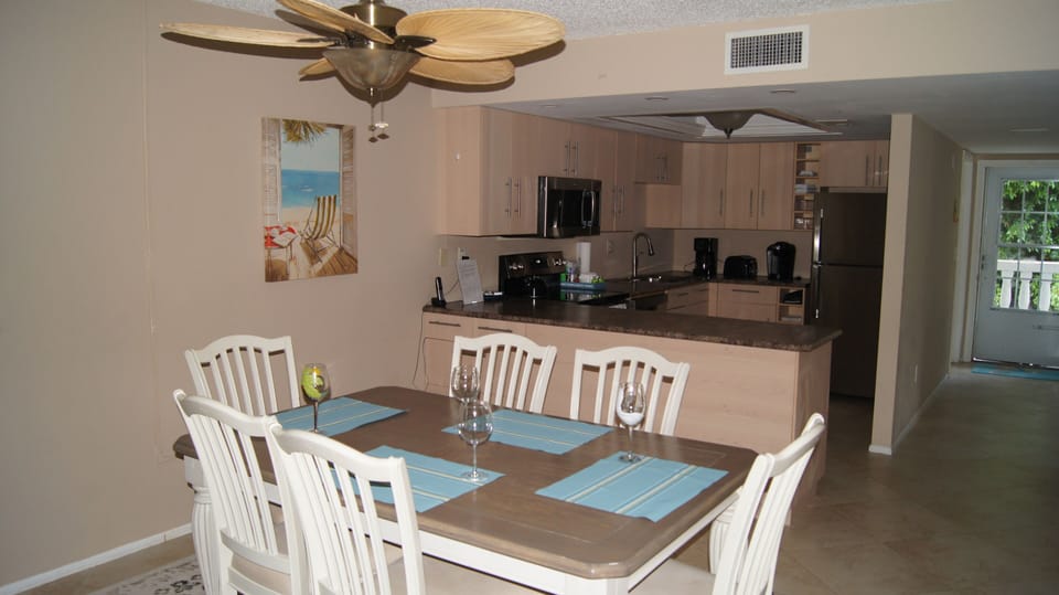 Dining room table and kitchen